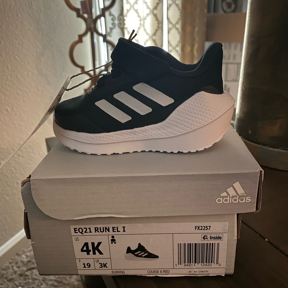 NWT ; never worn. Size 4K in kids. Adidas EQ21 Run EL I